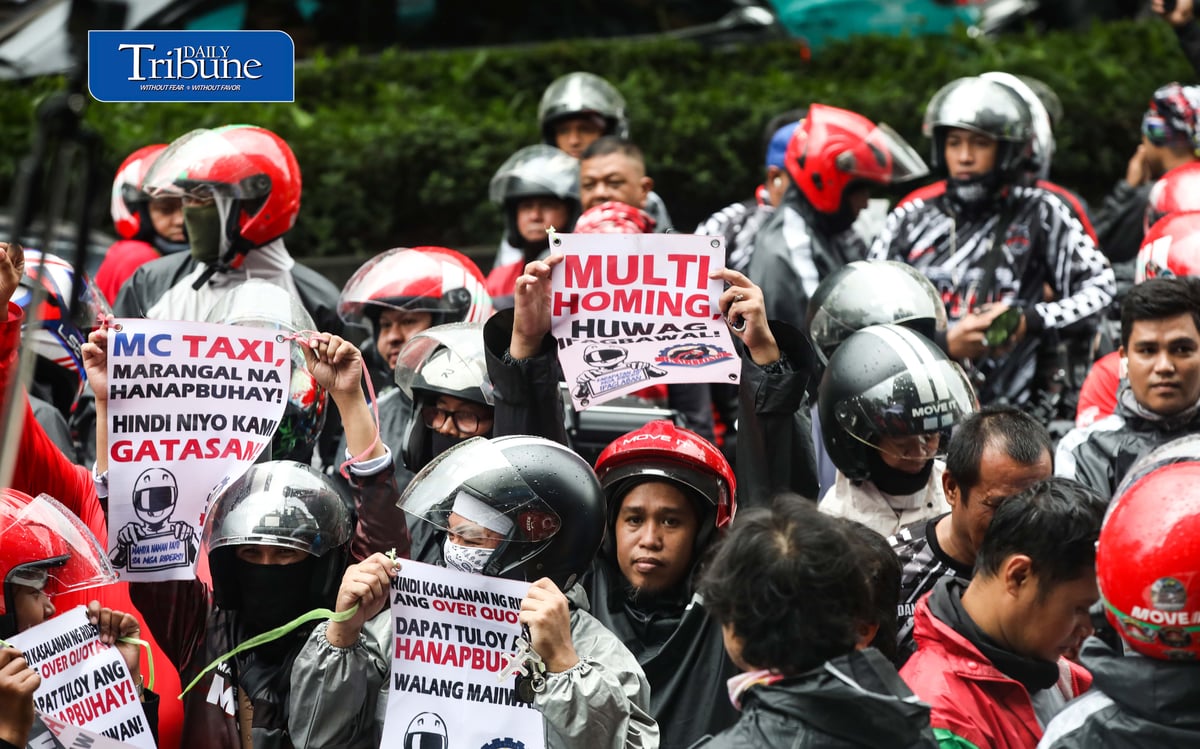 (August 04 2026) Motor taxi riders from various ride-hailing applications conduct a motorcade from people power monument to outside of the Land Transportation Franchising and Regulatory Board office along Kalayaan Avenue in Quezon City on Tuesday August 4 2026, to stage a protest, the protesters opposed a reported move to end “multi-homing,” the practice that allows riders to work across multiple ride-hailing platforms. They claimed the policy would prevent them from switching between applications and alleged that the change is intended to accommodate a new market entrant. Photo/Analy Labor
