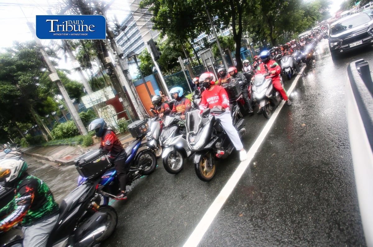 (August 04 2026) Motor taxi riders from various ride-hailing applications conduct a motorcade from people power monument to outside of the Land Transportation Franchising and Regulatory Board office along Kalayaan Avenue in Quezon City on Tuesday August 4 2026, to stage a protest, the protesters opposed a reported move to end “multi-homing,” the practice that allows riders to work across multiple ride-hailing platforms. They claimed the policy would prevent them from switching between applications and alleged that the change is intended to accommodate a new market entrant. Photo/Analy Labor