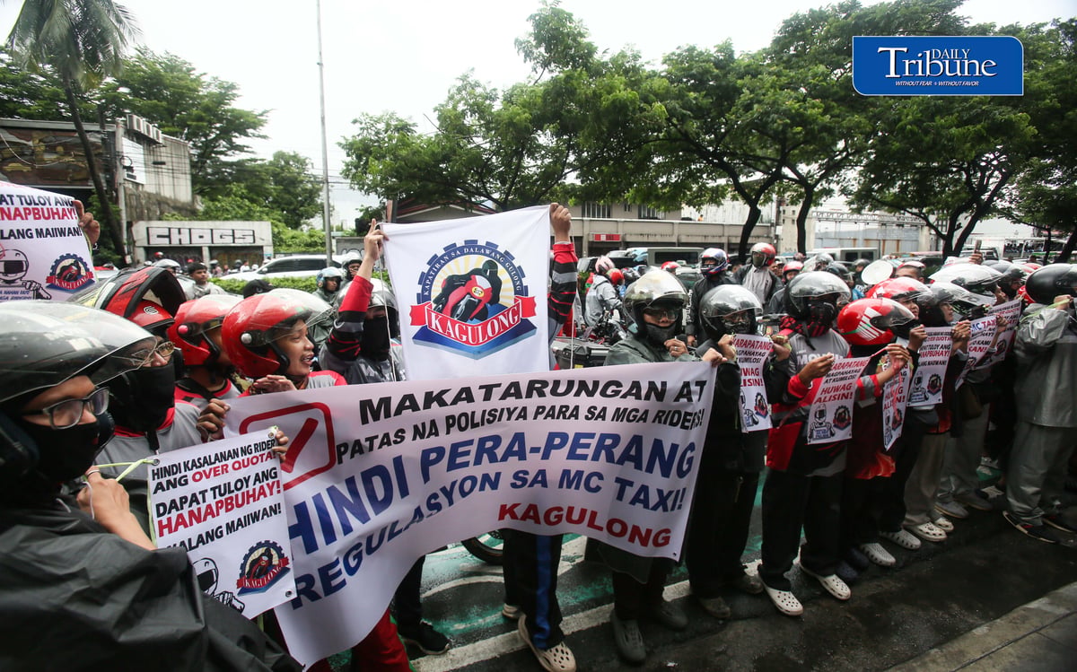 (August 04 2026) Motor taxi riders from various ride-hailing applications conduct a motorcade from people power monument to outside of the Land Transportation Franchising and Regulatory Board office along Kalayaan Avenue in Quezon City on Tuesday August 4 2026, to stage a protest, the protesters opposed a reported move to end “multi-homing,” the practice that allows riders to work across multiple ride-hailing platforms. They claimed the policy would prevent them from switching between applications and alleged that the change is intended to accommodate a new market entrant. Photo/Analy Labor