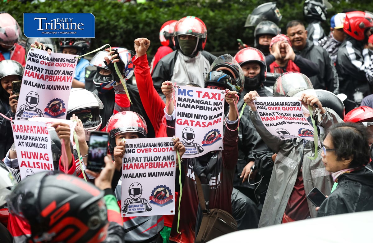 (August 04 2026) Motor taxi riders from various ride-hailing applications conduct a motorcade from people power monument to outside of the Land Transportation Franchising and Regulatory Board office along Kalayaan Avenue in Quezon City on Tuesday August 4 2026, to stage a protest, the protesters opposed a reported move to end “multi-homing,” the practice that allows riders to work across multiple ride-hailing platforms. They claimed the policy would prevent them from switching between applications and alleged that the change is intended to accommodate a new market entrant. Photo/Analy Labor