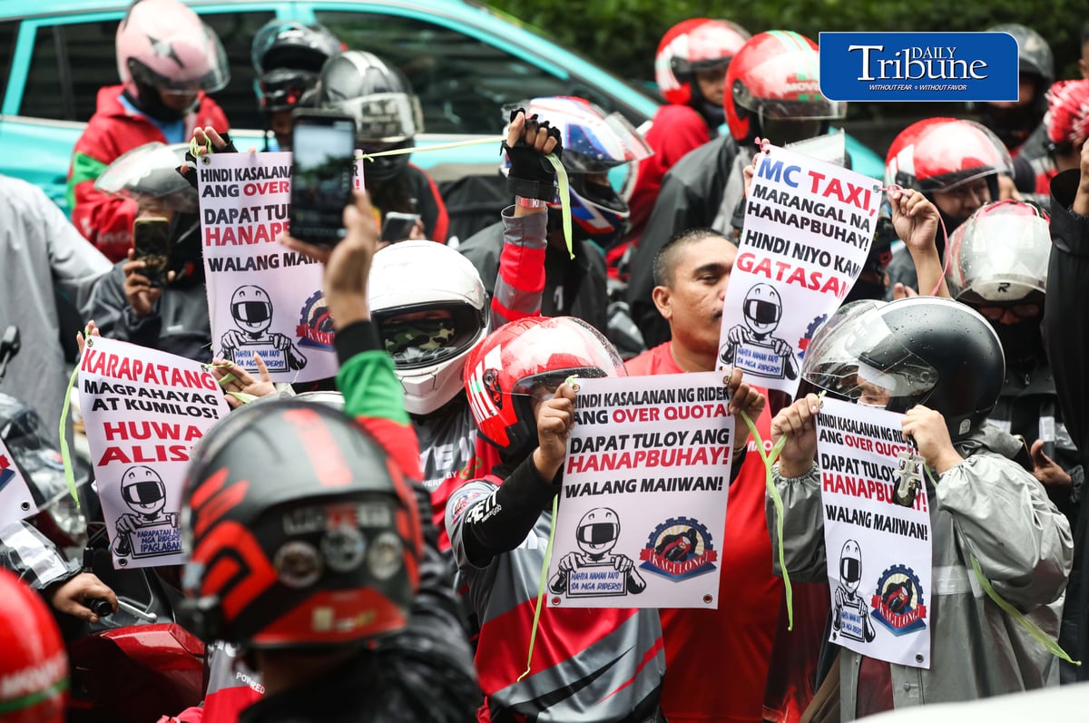 (August 04 2026) Motor taxi riders from various ride-hailing applications conduct a motorcade from people power monument to outside of the Land Transportation Franchising and Regulatory Board office along Kalayaan Avenue in Quezon City on Tuesday August 4 2026, to stage a protest, the protesters opposed a reported move to end “multi-homing,” the practice that allows riders to work across multiple ride-hailing platforms. They claimed the policy would prevent them from switching between applications and alleged that the change is intended to accommodate a new market entrant. Photo/Analy Labor