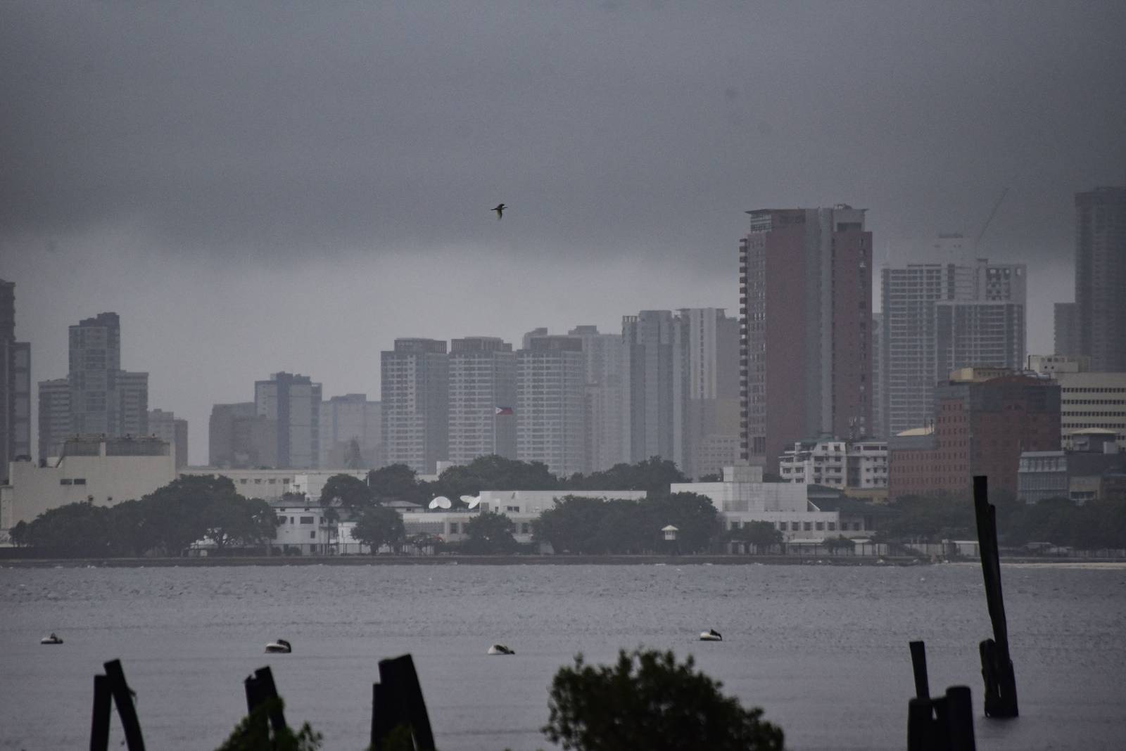A view of buildings of Manila along with the port of Manila is seen while the inclement weather brought by the southwest moonsoon today, August 5. l Zedrich Xylak Madrid