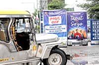 A jeepney pushes its way to a gasoline station in Quezon City on Wednesday to ensure that it can service passengers in the area.