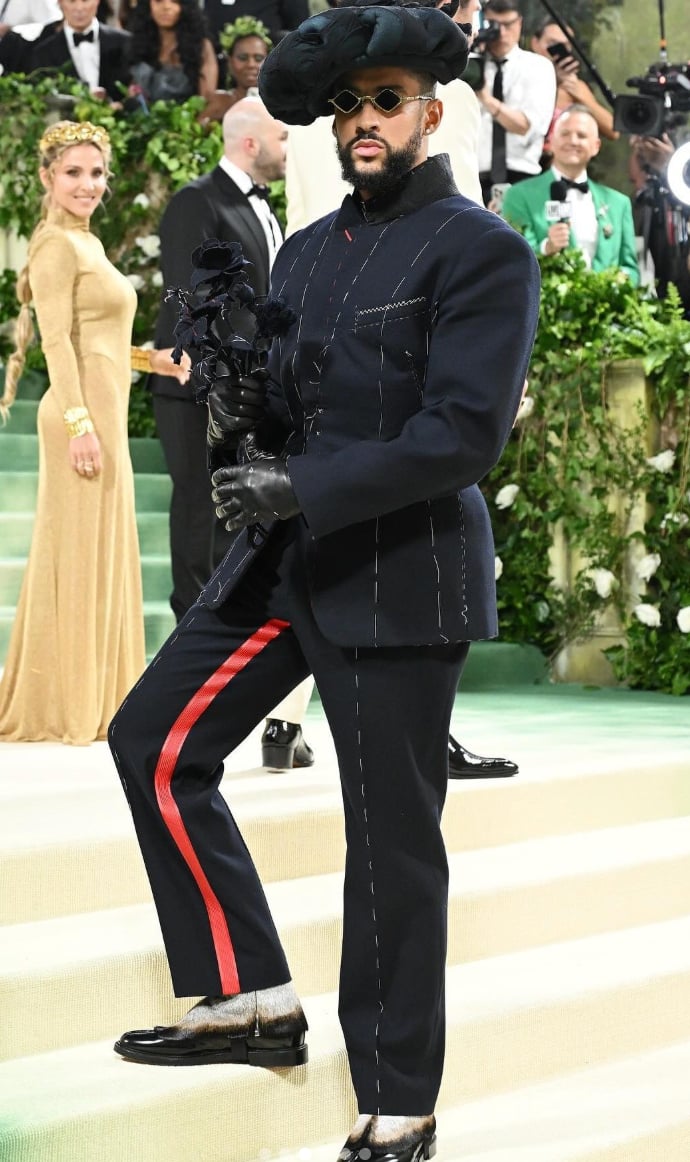 Bad Bunny wore a bespoke Maison Margiela Artisanal suit designed by Galliano.