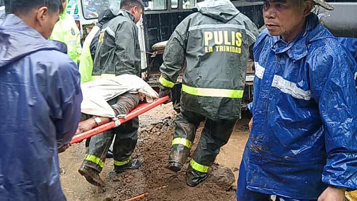Tragic aftermath Landslides north of Luzon on 6 August offer a scene familiar during typhoon season: muddy ground, sober faces, rescuers carrying a victim’s body on a stretcher retrieved from a landslide at a village in La Trinidad, Benguet province. Heavy rains driven by a tropical depression have raked the country’s north and forced school closures.