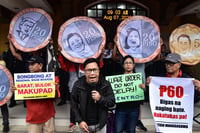 Workers protest over stalled wage hike