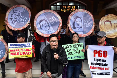 Workers protest over stalled wage hike