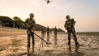 Floods wash landmines into shore
