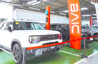VEHICLES including the BAIC B30e Dune are displayed at the new Cebu dealership.
