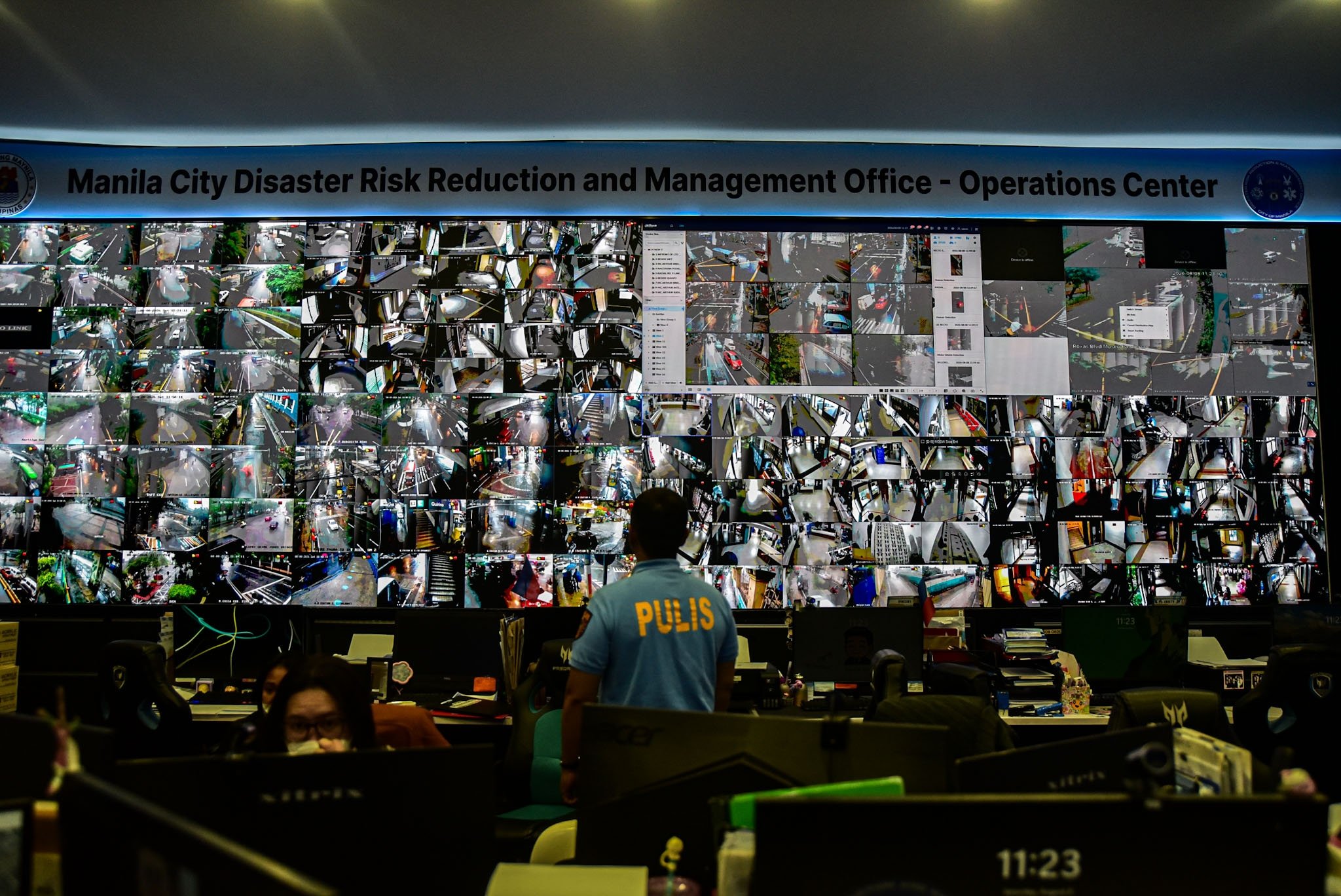Manila Disaster Personnel Monitor Flood-Prone Areas