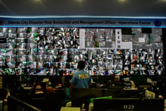 Manila Disaster Personnel Monitor Flood-Prone Areas