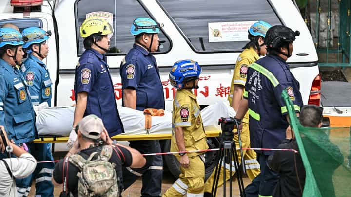 The body of a school shooting victim is carried out of the school premises in Bang Kruai district, Nonthaburi province, north of the Thai capital Bangkok, on August 7, 2026. A teenager described as "troubled" by a classmate killed his grandparents before gunning down at least six more people at a school in Thailand on August 7, police said.