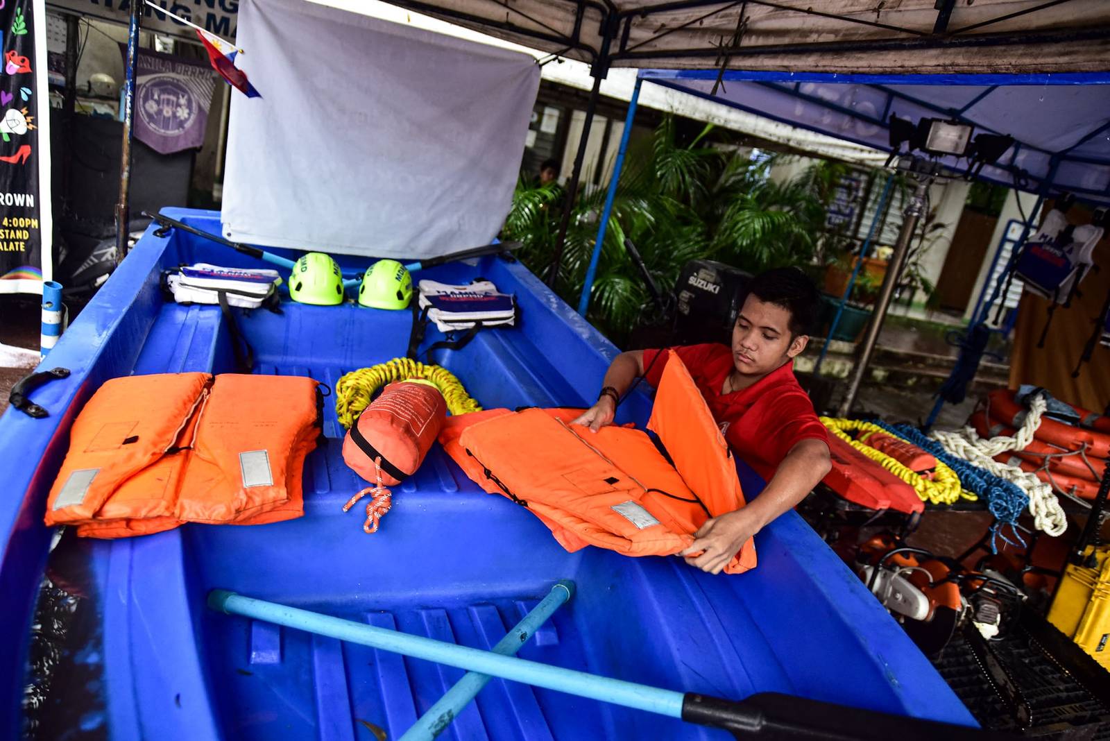Search and rescue equipment is prepared by a responder on standby at the Manila City Disaster Risk Reduction and Management Office headquarters along Quirino Avenue in Manila on August 8. | Zedrich Xylak Madrid