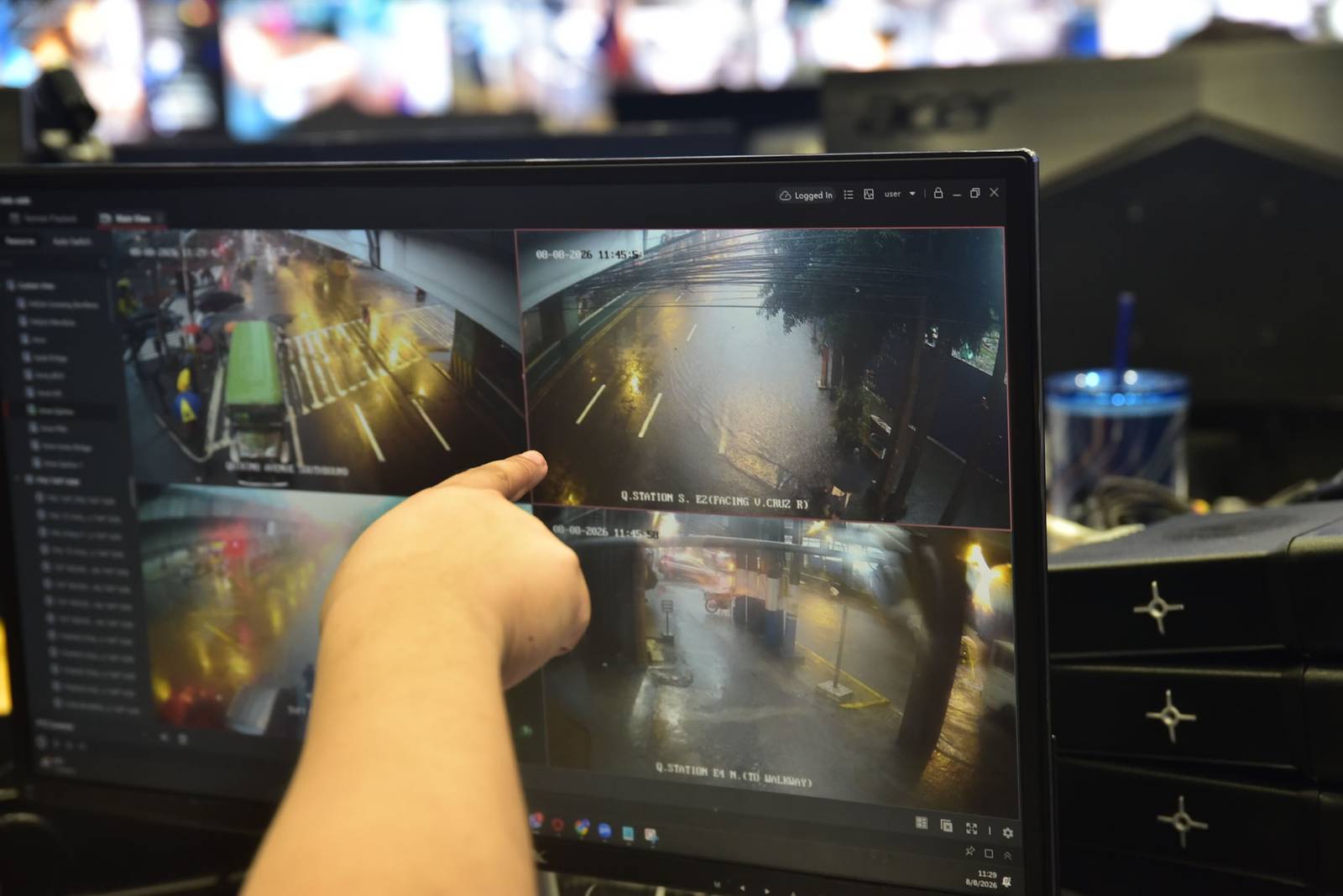 Personnel from the Manila City Disaster Risk Reduction and Management Department monitor flood-prone areas in Manila as the enhanced southwest monsoon brings heavy rains and flooding on August 8. | Zedrich Xylak Madrid
