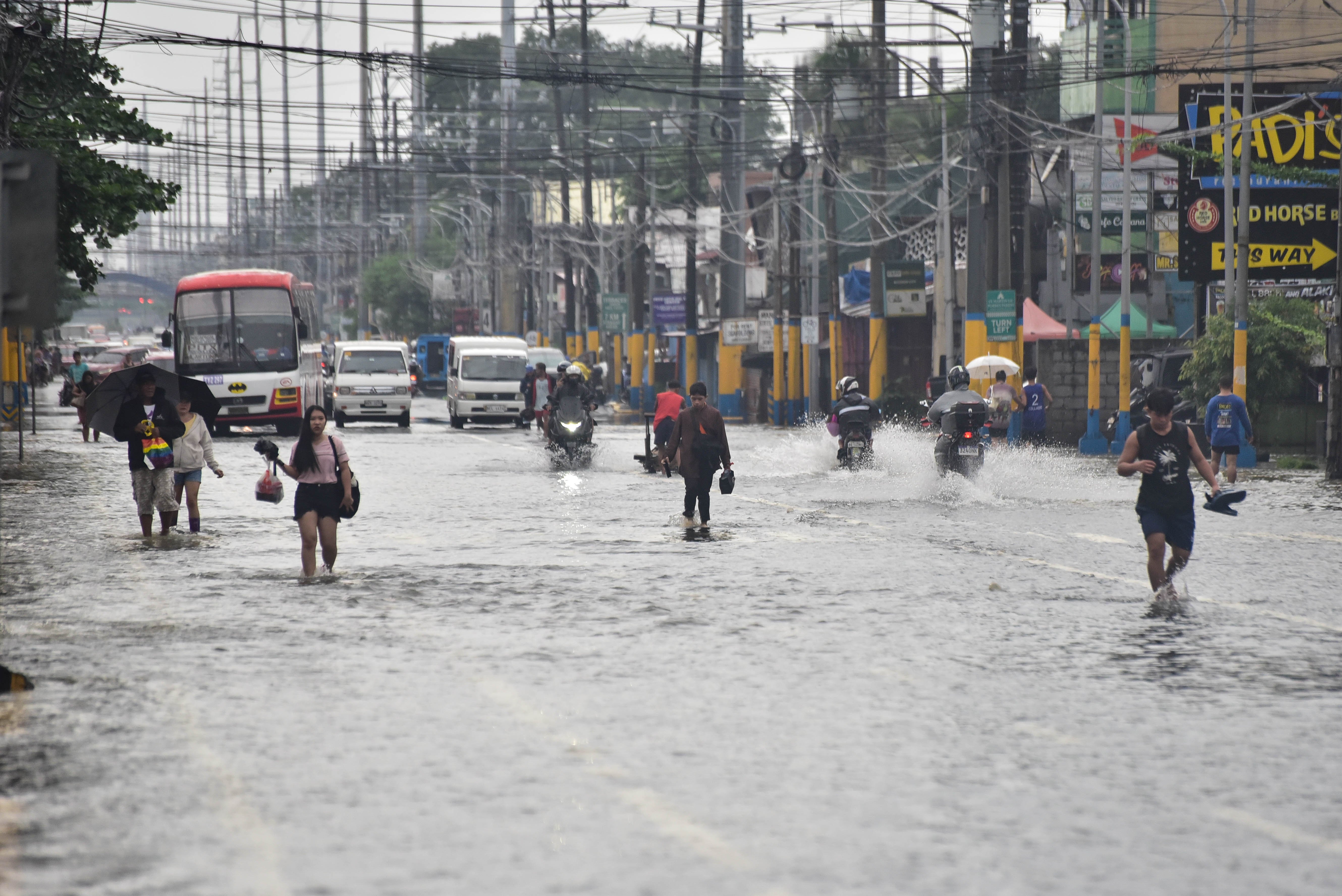 Emilio Aguinaldo Highway ankle deep flood brought by habagat
