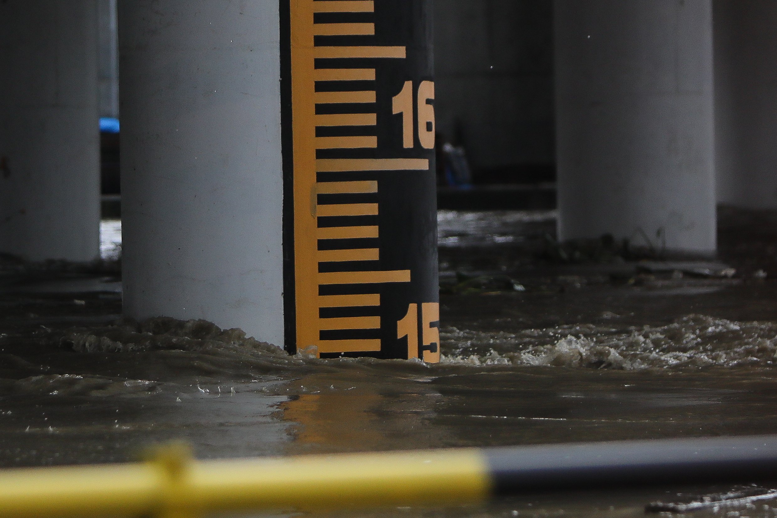 Scenes along the Marikina-Pasig border as Metro Manila remains under a Red Rainfall Warning and the Pasig River rises to 15 cubic meters. | Aram Lascano