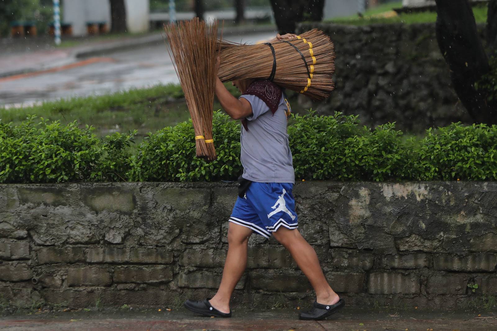 Scenes along the Marikina-Pasig border as Metro Manila remains under a Red Rainfall Warning and the Pasig River rises to 15 cubic meters. | Aram Lascano