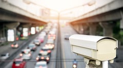 Angers mount over car license plate cameras