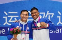 Eumir Marcial (right) gets an assurance from ABAP president Marcus Manalo that there is room for him in the national team provided that he focuses in Olympic-style boxing.