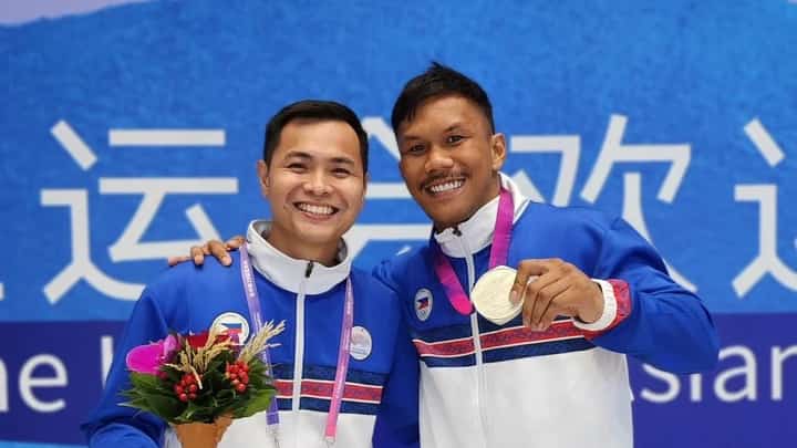 Eumir Marcial (right) gets an assurance from ABAP president Marcus Manalo that there is room for him in the national team provided that he focuses in Olympic-style boxing.