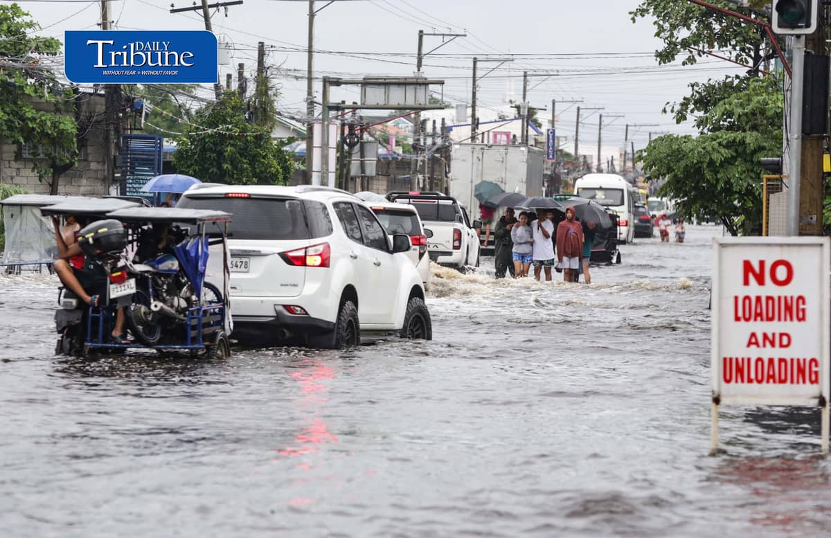 (August 10 2026) Motorists bravely navigated the flood along the Mc Arthur Highway, in Brgy Sta Monica, San Simon, Pampanga, on Monday August 10 2026. Pagasa bureau said southwest monsoon, locally known as habagat, will still prevail over parts of Luzon and Visayas, possible flash floods or landslides due to moderate to heavy rains. Photo/Analy Labor