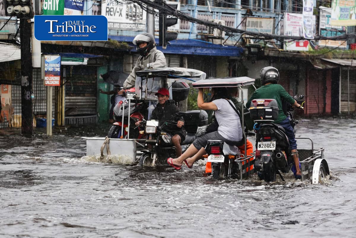 (August 10 2026) Motorists bravely navigated the flood along the Mc Arthur Highway, in Brgy Sta Monica, San Simon, Pampanga, on Monday August 10 2026. Pagasa bureau said southwest monsoon, locally known as habagat, will still prevail over parts of Luzon and Visayas, possible flash floods or landslides due to moderate to heavy rains. Photo/Analy Labor