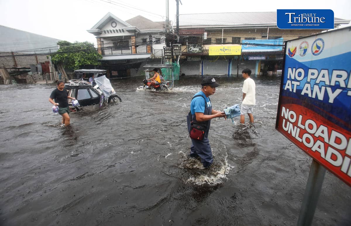 (August 10 2026) Motorists bravely navigated the flood along the Mc Arthur Highway, in Brgy Sta Monica, San Simon, Pampanga, on Monday August 10 2026. Pagasa bureau said southwest monsoon, locally known as habagat, will still prevail over parts of Luzon and Visayas, possible flash floods or landslides due to moderate to heavy rains. Photo/Analy Labor