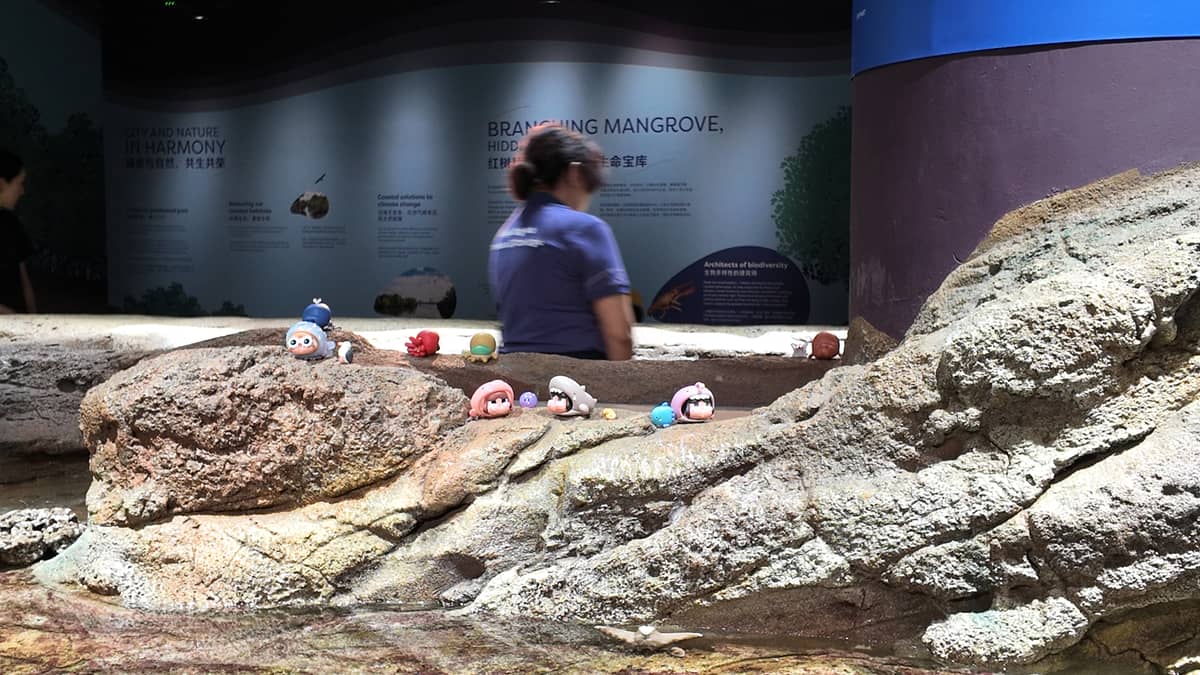 Oversized CryBaby installations add a playful touch to Singapore Oceanarium’s marine exhibits.