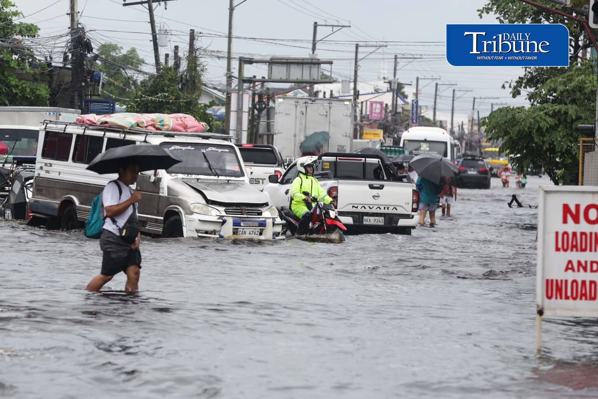 (August 10 2026) Motorists bravely navigated the flood along the Mc Arthur Highway, in Brgy Sta Monica, San Simon, Pampanga, on Monday August 10 2026. Pagasa bureau said southwest monsoon, locally known as habagat, will still prevail over parts of Luzon and Visayas, possible flash floods or landslides due to moderate to heavy rains. Photo/Analy Labor