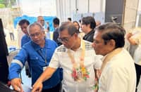 SENIOR Science Research Specialist Rodrigo E. Cortez Jr. (in blue) demonstrates the Steiner Tunnel to DOST Secretary Renato U. Solidum Jr. (middle) and DOST FPRDI Director Rico J. Cabangon.