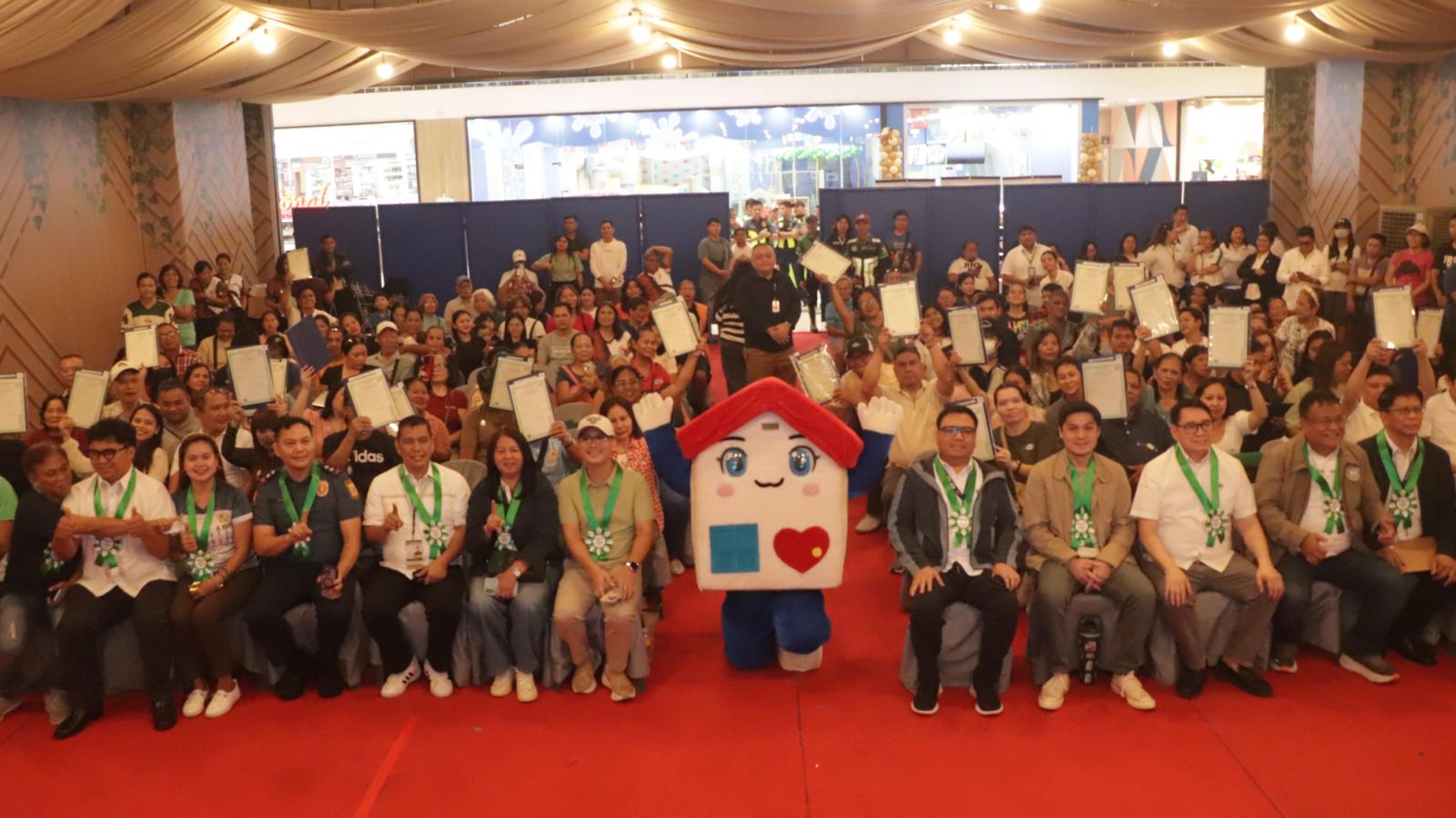 Nearly 50 Laguna families finally get land titles under 4PH