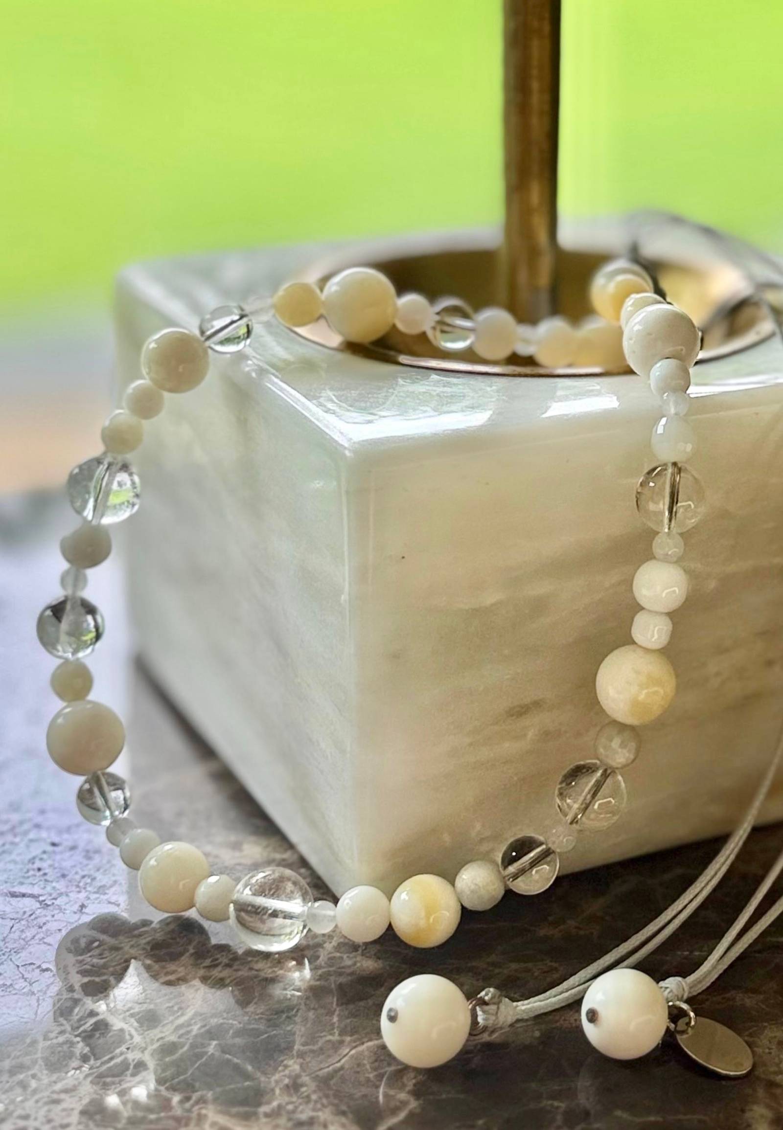 The marble base of the lamp highlighting the catch-all tray feature.