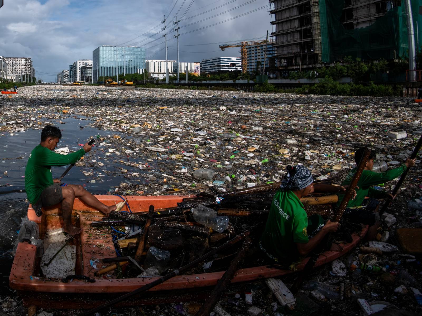 Estero rangers from the DPWH, MMDA, DENR and Parañaque City clear tons of garbage trapped in a drainage channel in Baclaran on 11 August 2026. The multi-agency flood-mitigation operation aims to reduce urban flooding following torrential rains brought by the southwest monsoon. Department of Public Works and Highways Secretary Vince Dizon oversees the clearing operations.