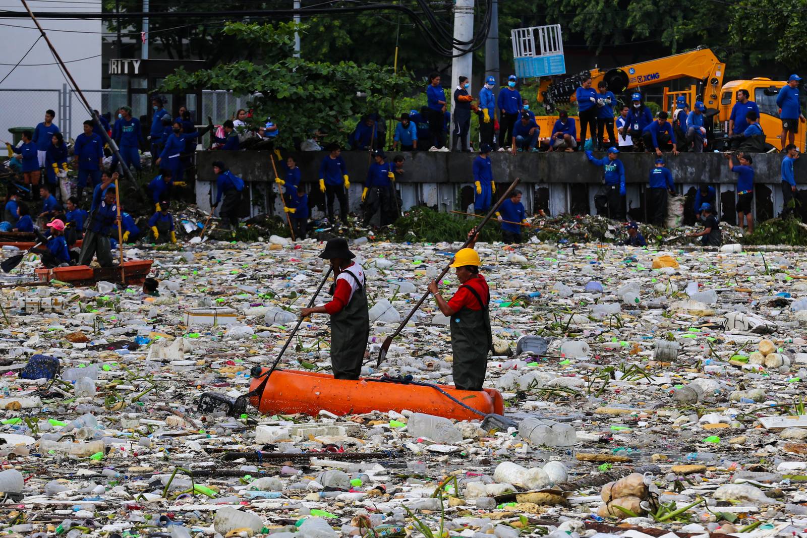 Estero rangers from the DPWH, MMDA, DENR and Parañaque City clear tons of garbage trapped in a drainage channel in Baclaran on 11 August 2026. The multi-agency flood-mitigation operation aims to reduce urban flooding following torrential rains brought by the southwest monsoon. Department of Public Works and Highways Secretary Vince Dizon oversees the clearing operations.
