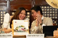 Nueva Ejica Rep. Mikaela Angela Suansing and House Speaker Faustino "Bojie" Dy during the ceremonial turnover of the 2027 National Expenditure Program to the House of Representatives on Tuesday, 11 August 2026.