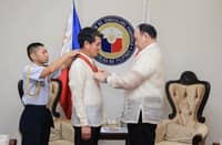 Defense chief honors outgoing Japanese ambassador