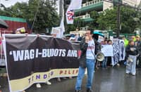 Members of Tindig Pilipinas staged a protest outside the Sandiganbayan Centennial Building in Quezon City on Wednesday, 12 August, in response to the anti-graft court granting former senator Ramon "Bong" Revilla's bail petition in connection to his case of malversation.
