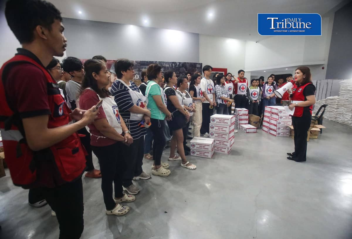 (August 13 2026) Philippine Red Cross Secretary General Dr. Gwen Pang brief volunteers during the repacking of relief packs at the Philippine Red Cross National Headquarters in Mandaluyong City on Thursday, August 13, 2026, volunteer pack more than 2,850 relief packs which will be given to residents affected by the southwest monsoon. Photo/Analy Labor