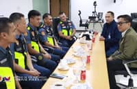 Three police officers receive commendations from National Police Commission Commissioner Ralph Calinisan for their role in subduing an armed robbery suspect along East Service Road in Muntinlupa City.