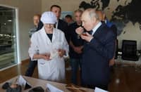 PRESIDENT Vladimir Putin tastes caviar as he visits the Yasny fish processing factory on Iturup island, on 13 August 2026.