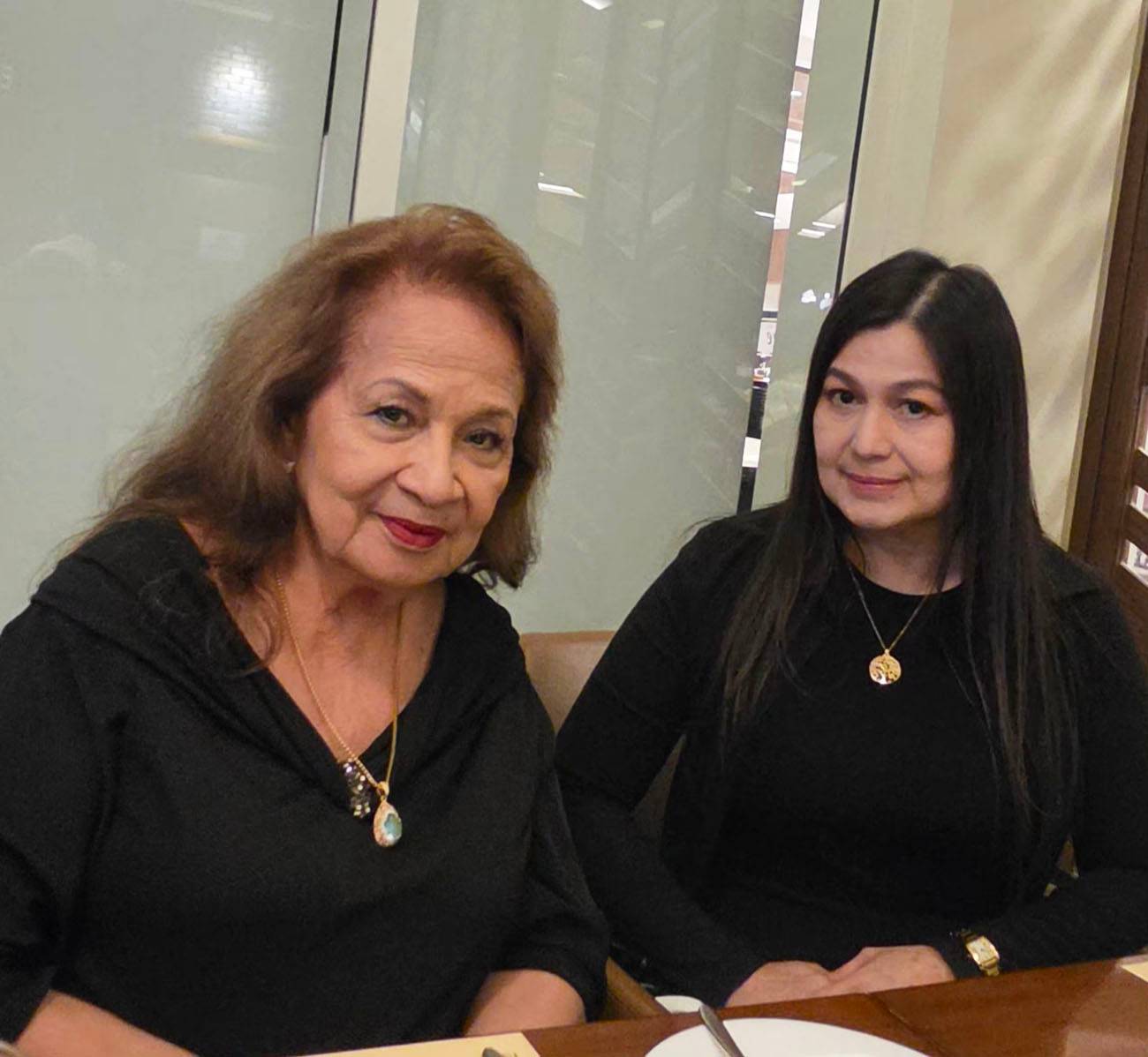 Mila Demecillo and Grace Colmenares Lerma.