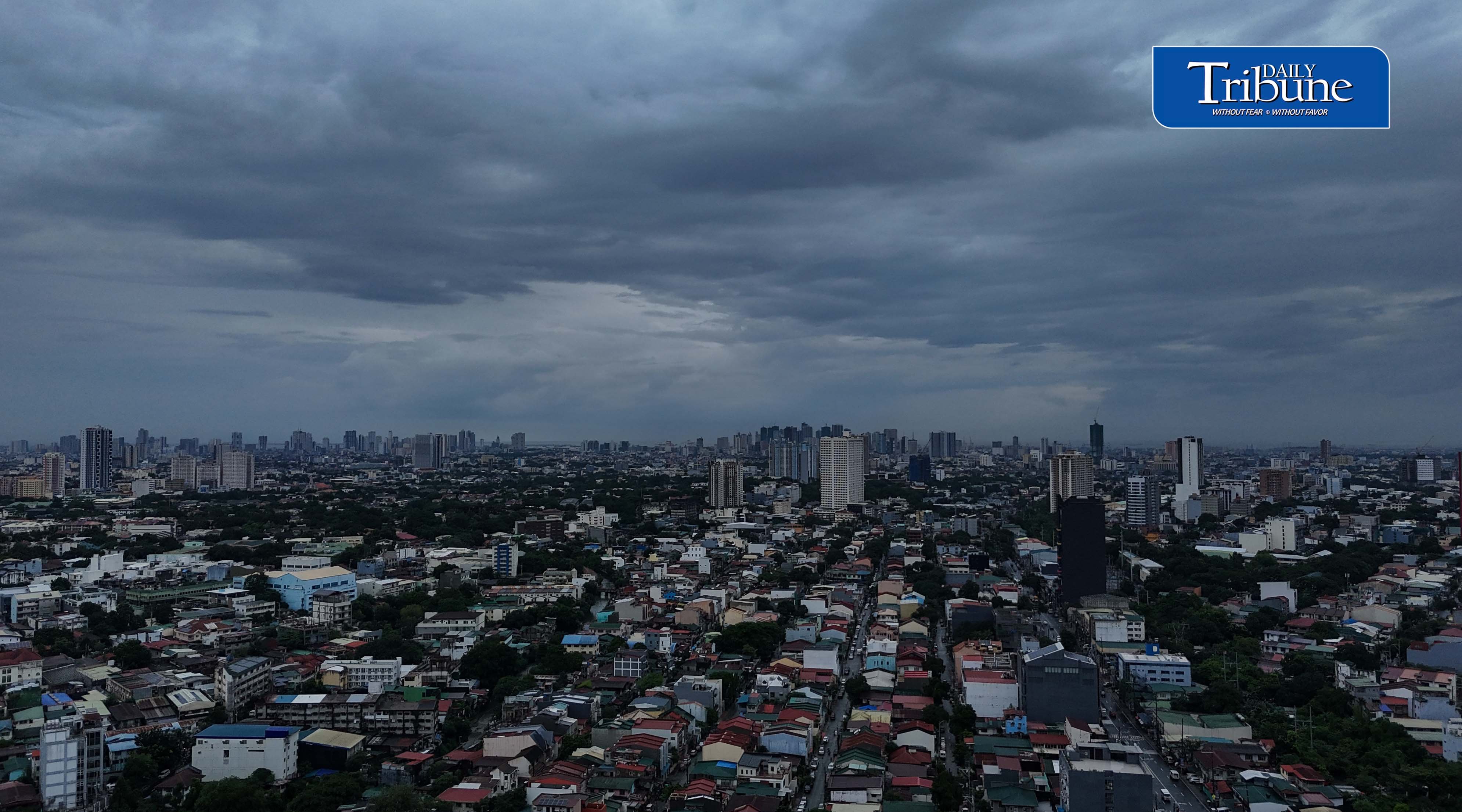 Dark clouds hover Metro Manila