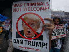 Protesters commemorate 1898 Mock Bottle of Manila