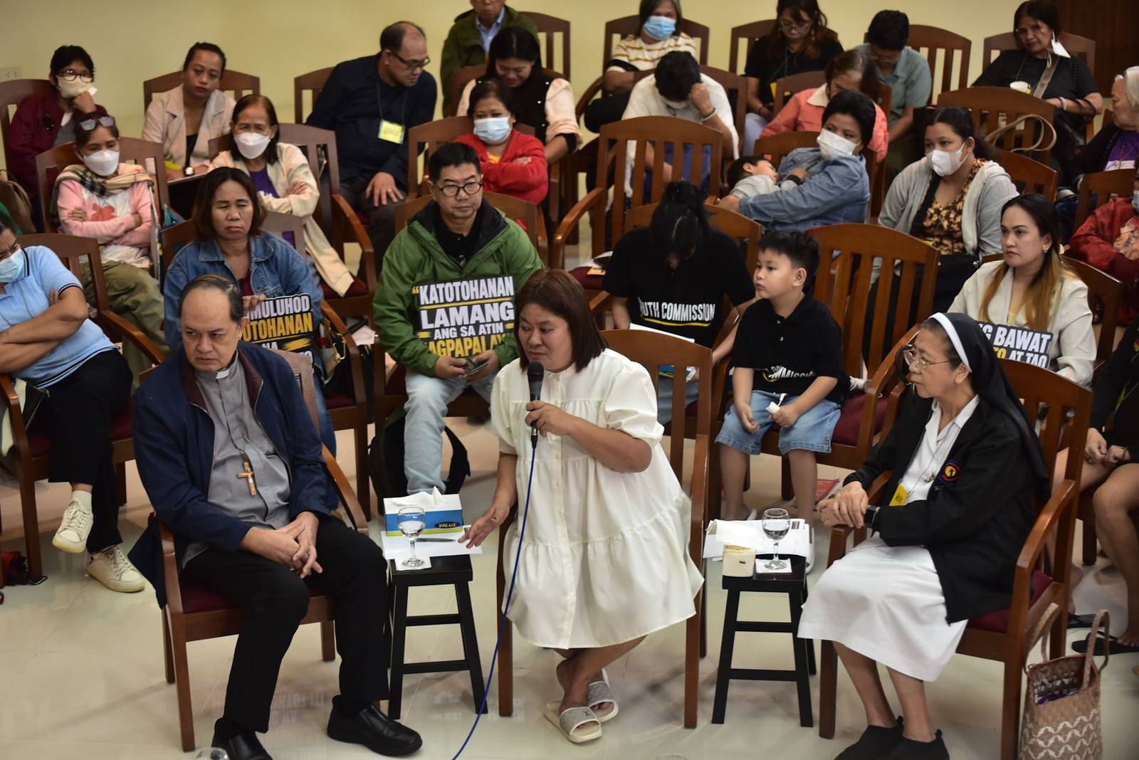 Victims, survivors, and families affected by killings during Duterte's drug war share their experiences during the civil society-led Truth Commission’s first public 'truth-telling session' at the Pope Pius XII Catholic Center in Manila on August 14. | Zedrich Xylak Madrid