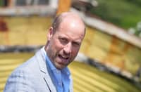 Britain’s Prince William, Prince of Wales, speaks by a fishing boat in the Old Town, during his visit to Hastings, south-east England on 9 July 2026, to highlight the town’s fishing community and the vital work of local youth-led and community-driven organizations.