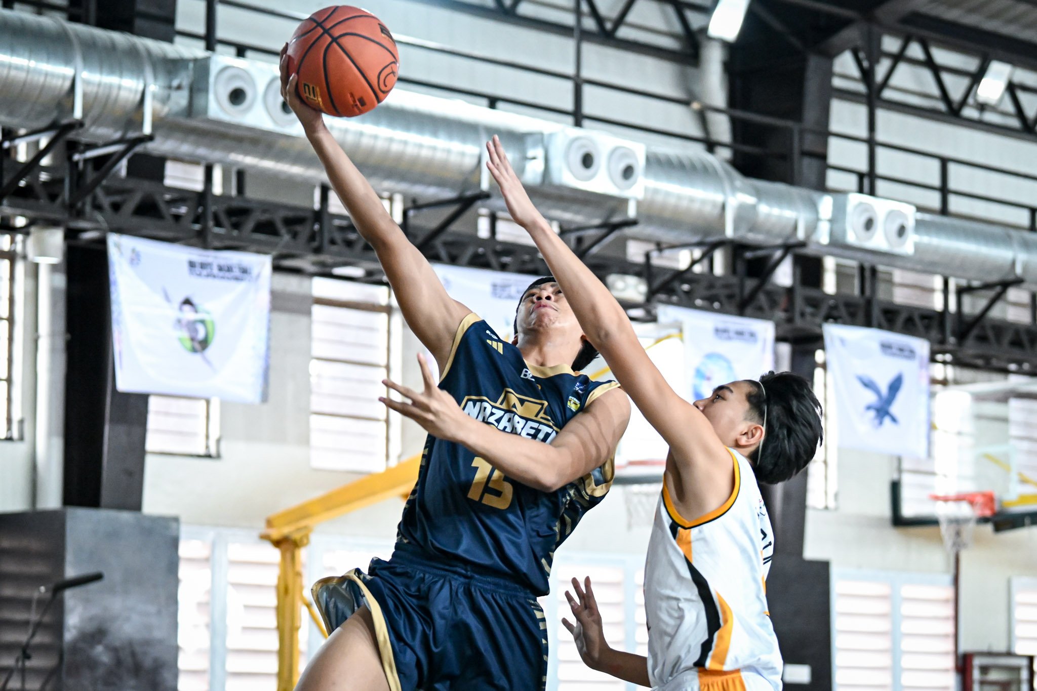 Bullpups open title defense on high note; UE prevails