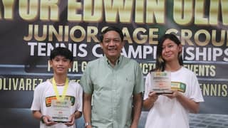 FRANCINE Wong (right) celebrates another double-title win alongside Jan Caleb Villeno (left) and Parañaque Youth and Sports Development head Alex Dandan in the Mayor Edwin Olivarez Juniors Age Group Tennis Championships last Thursday.