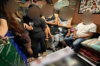 Authorities secure five suspects and confiscated evidence following an early morning raid on an active drug den along Villa Street in Barangay Central Bicutan, Taguig City, on Sunday.