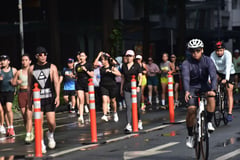 Joggers brave torrential rain along Ayala Avenue