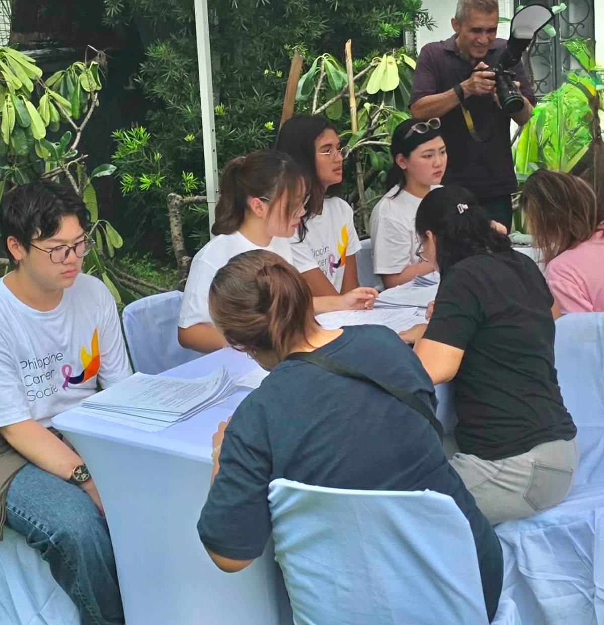At the registration are Liam and Haley Chua, Anechka Estrada and Sofia Copok.
